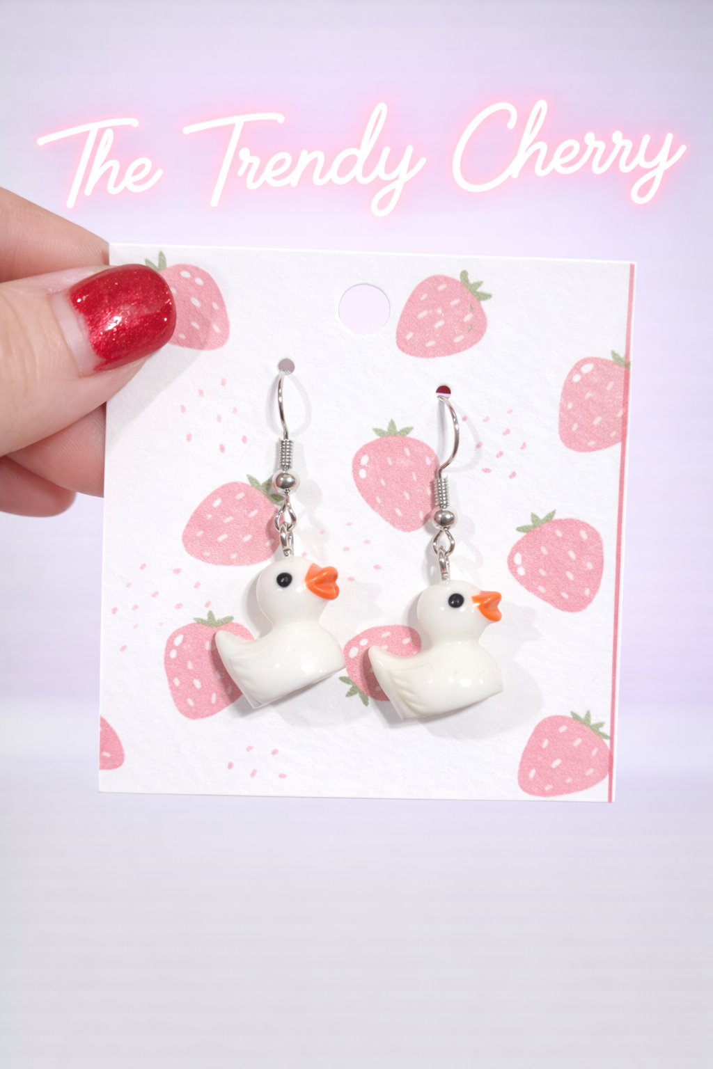 White cruising duck earrings