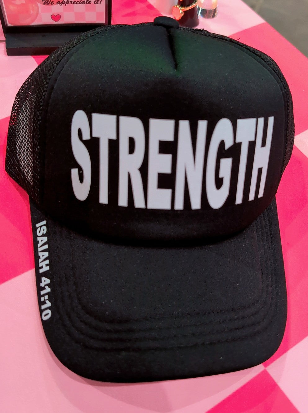 Strength black trucker hat - Isaiah 41:10