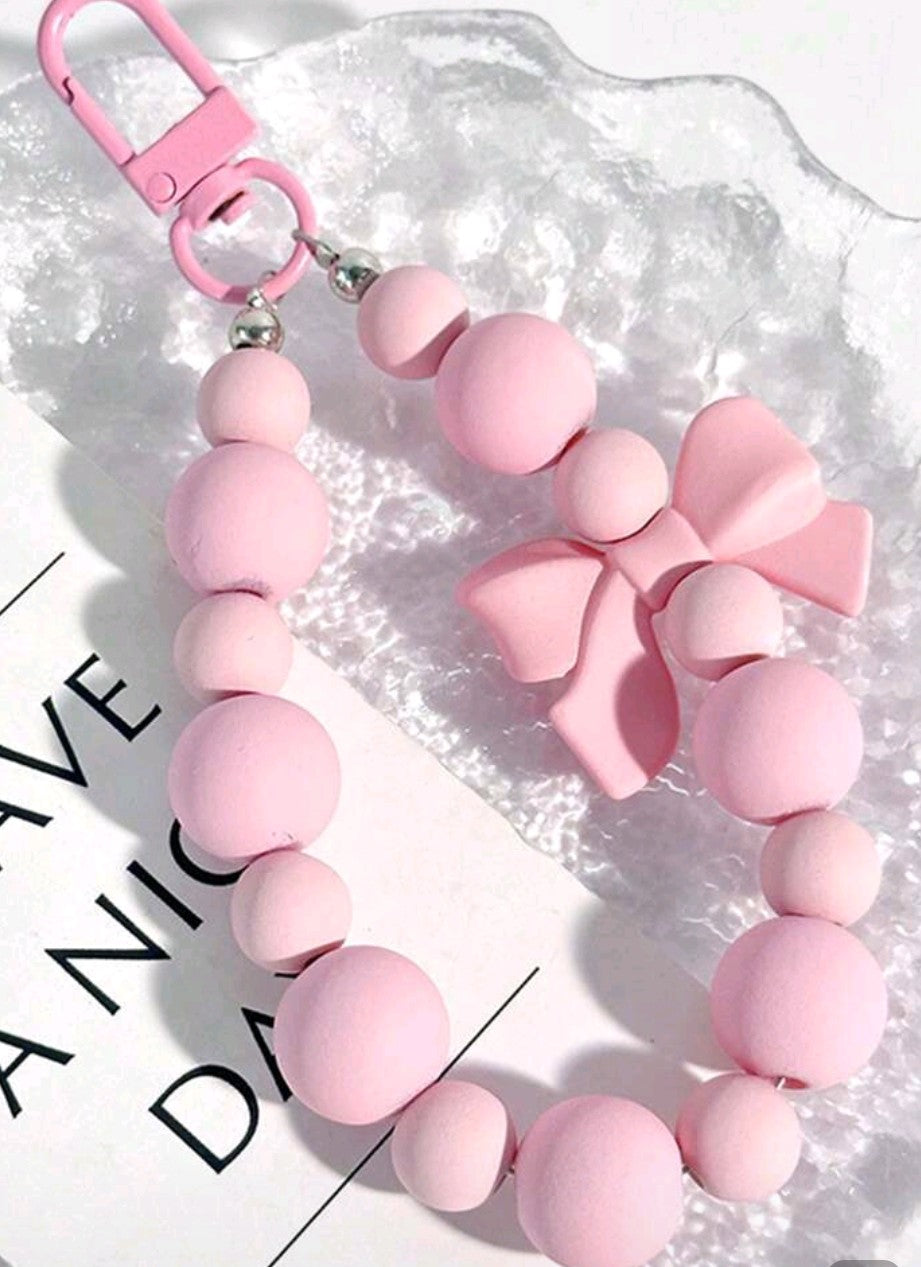 Pink bow wristlet key chain