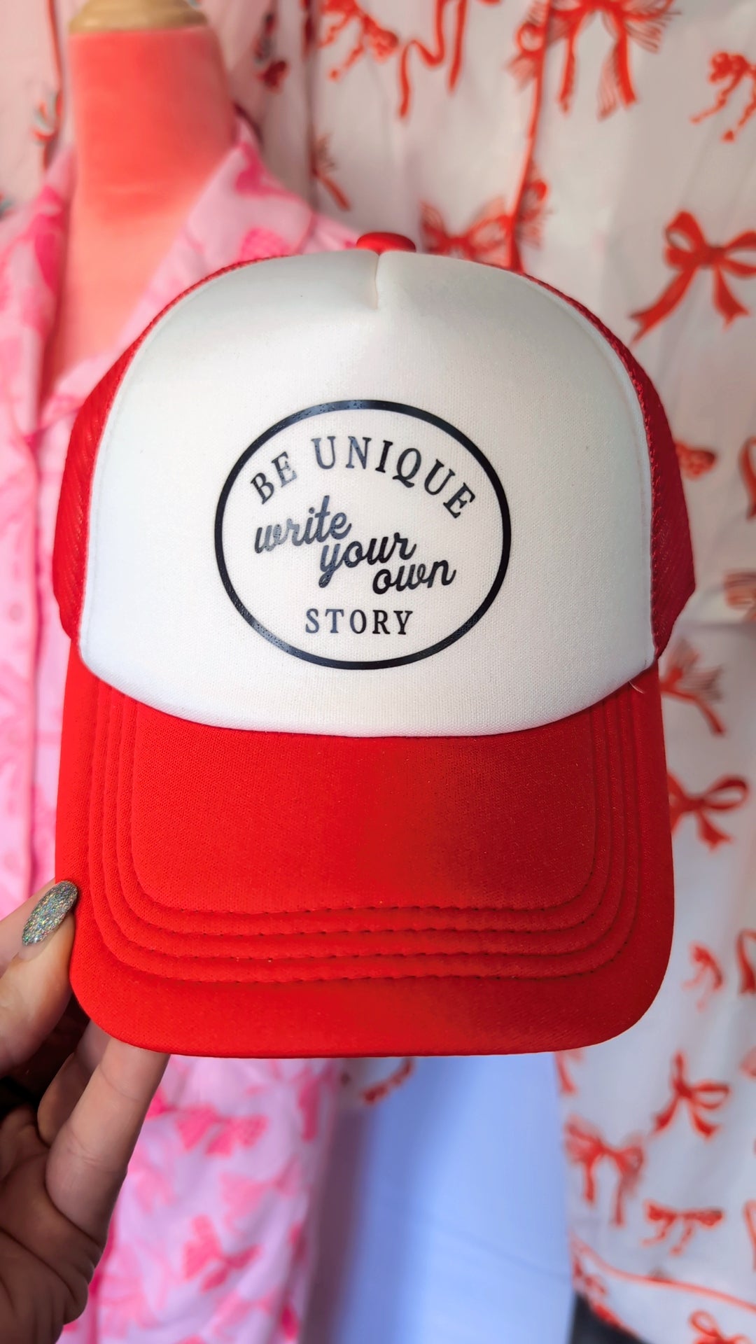 Be Unique- write your own story. Red mesh trucker hat