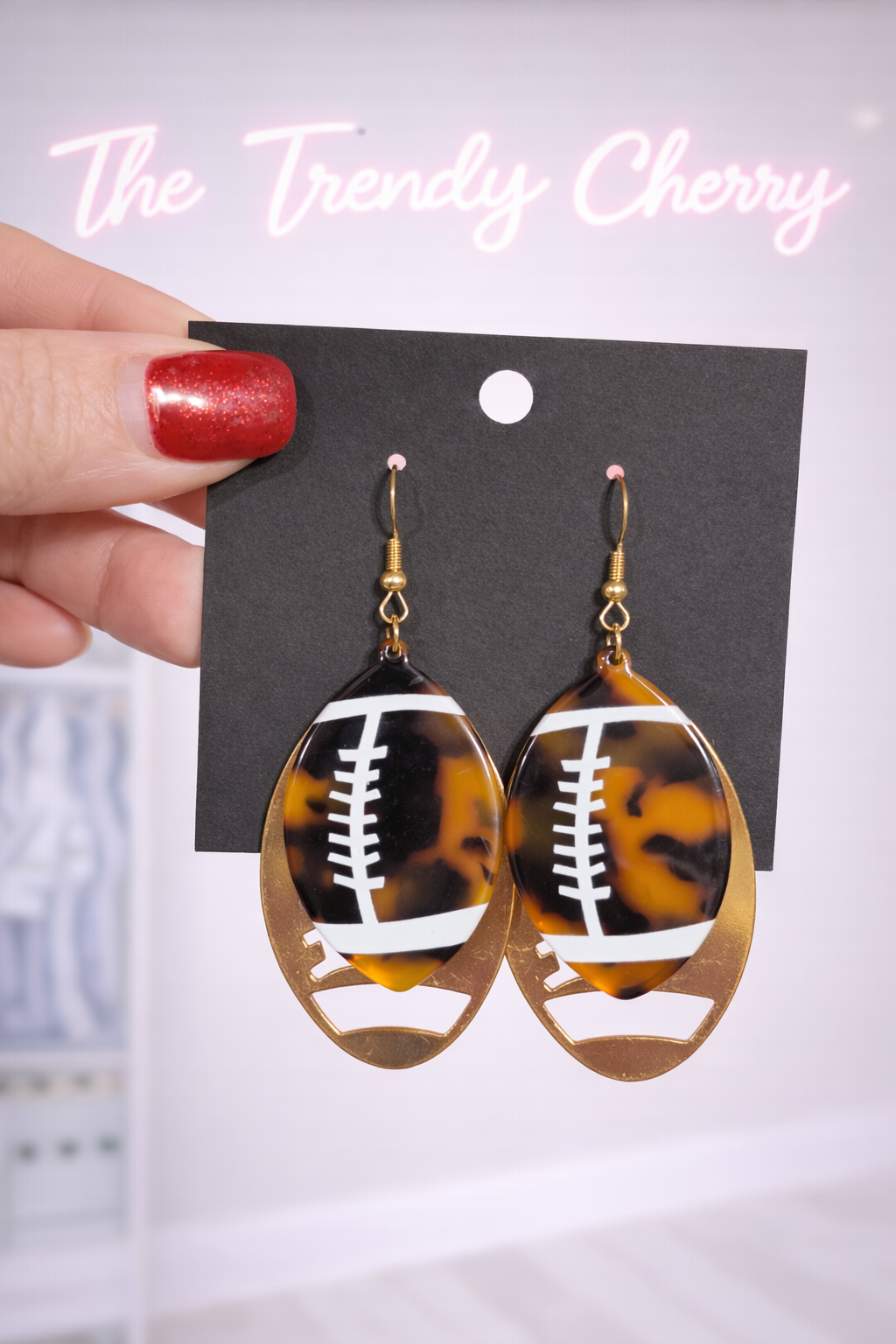 Double layered football earrings