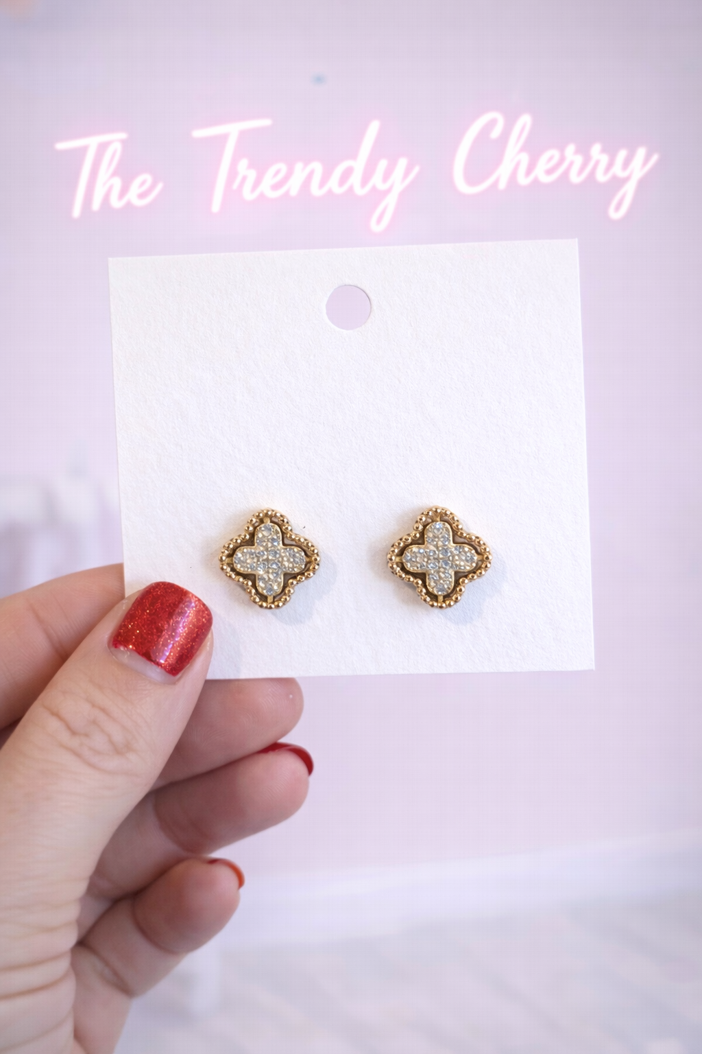 Gold and silver stoned clover earrings