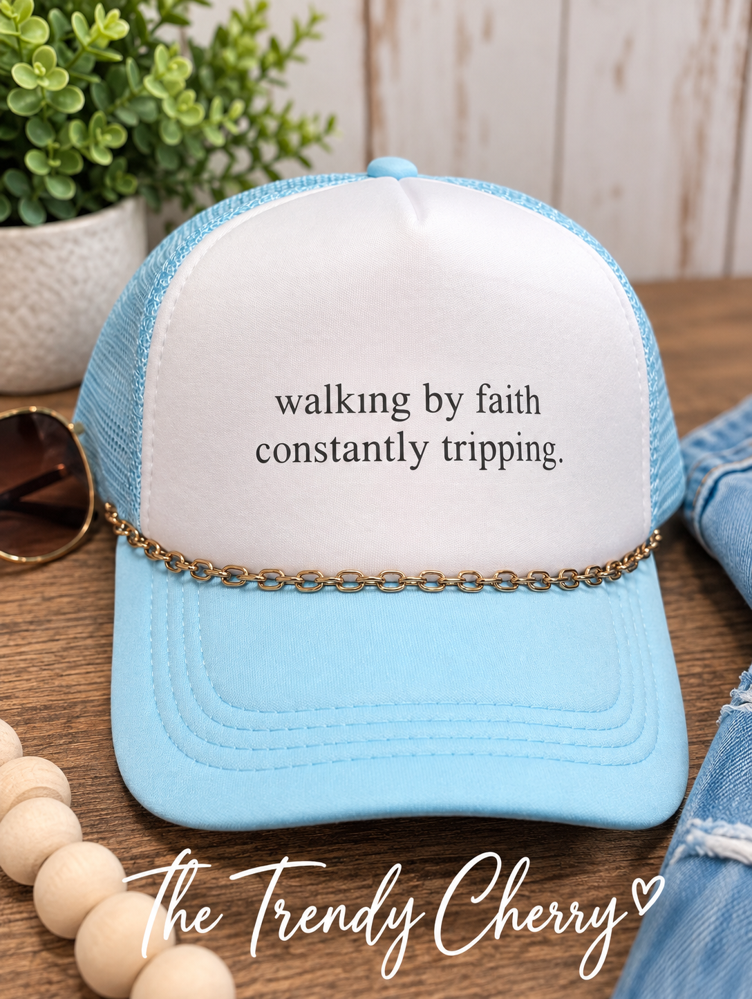 Blue Walking by faith, constantly tripping Trucker Hat with removable chain