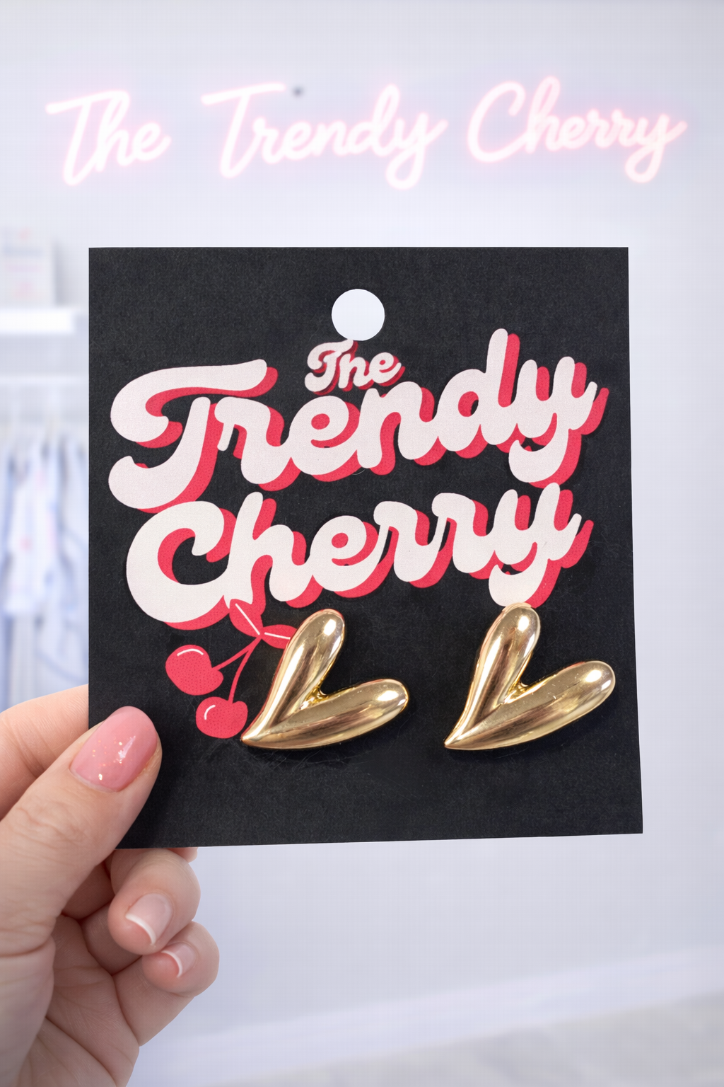 Trendy gold heart stud earrings