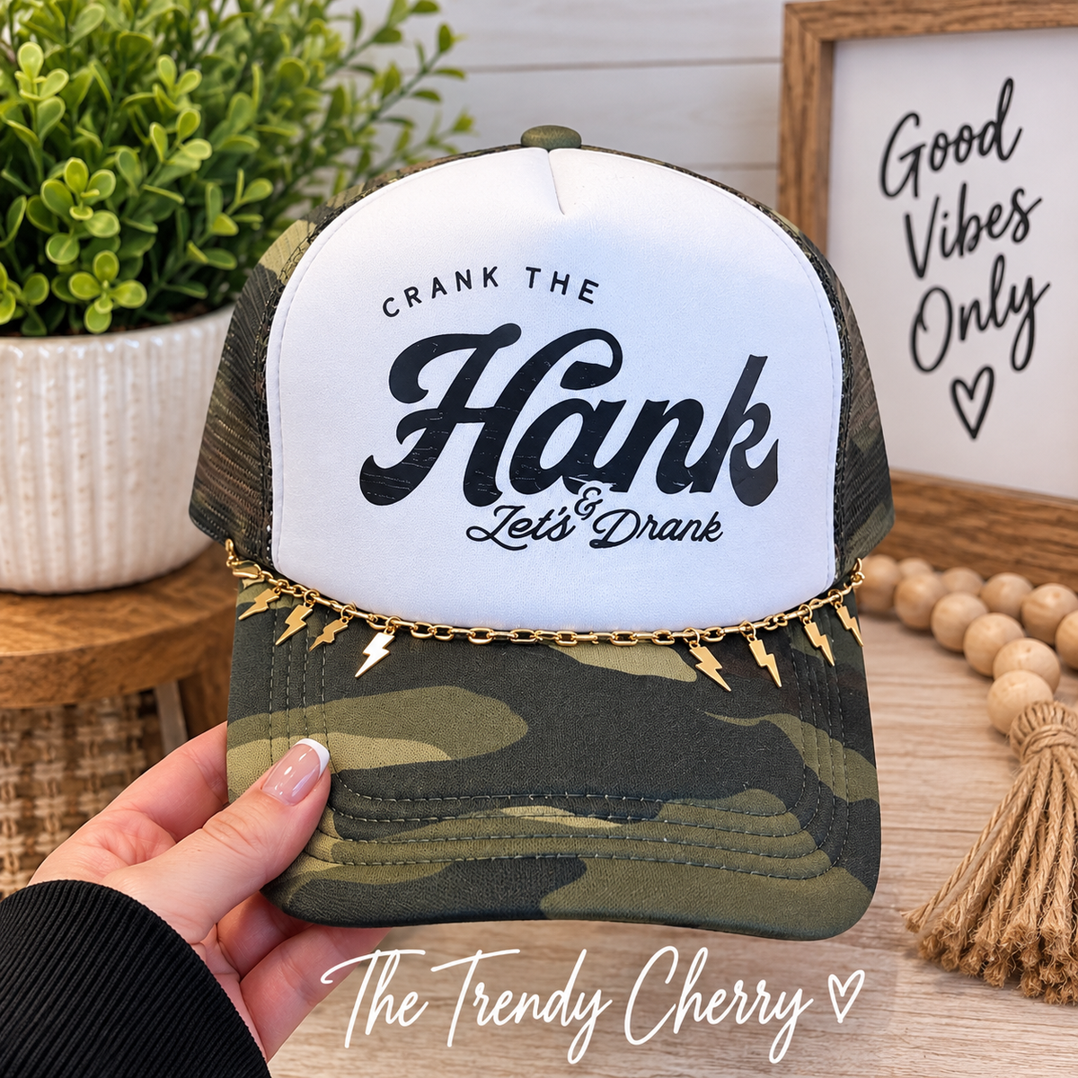 Crank the Hank Let's Drank Camo Trucker Hat with removable hat chain