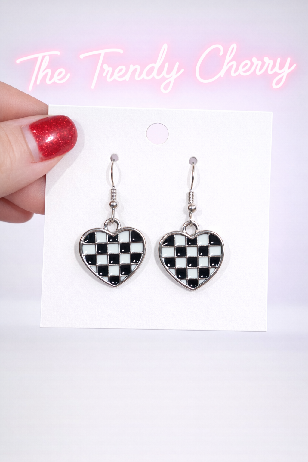 Black and white checkered heart earrings