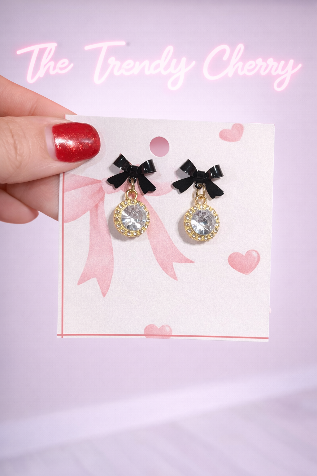 It's giving Audrey Hepburn black bow earrings