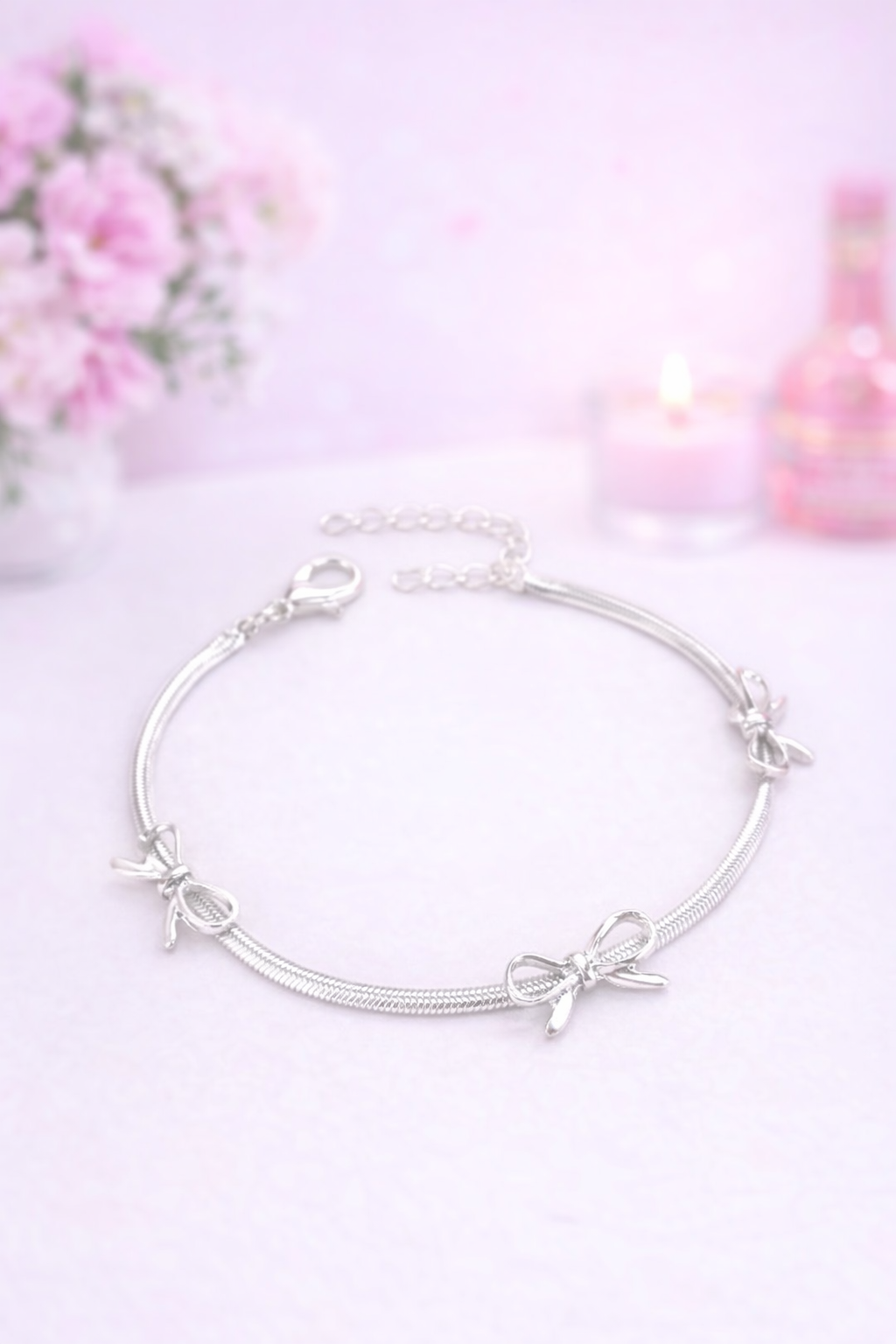 Silver bow heart bracelet
