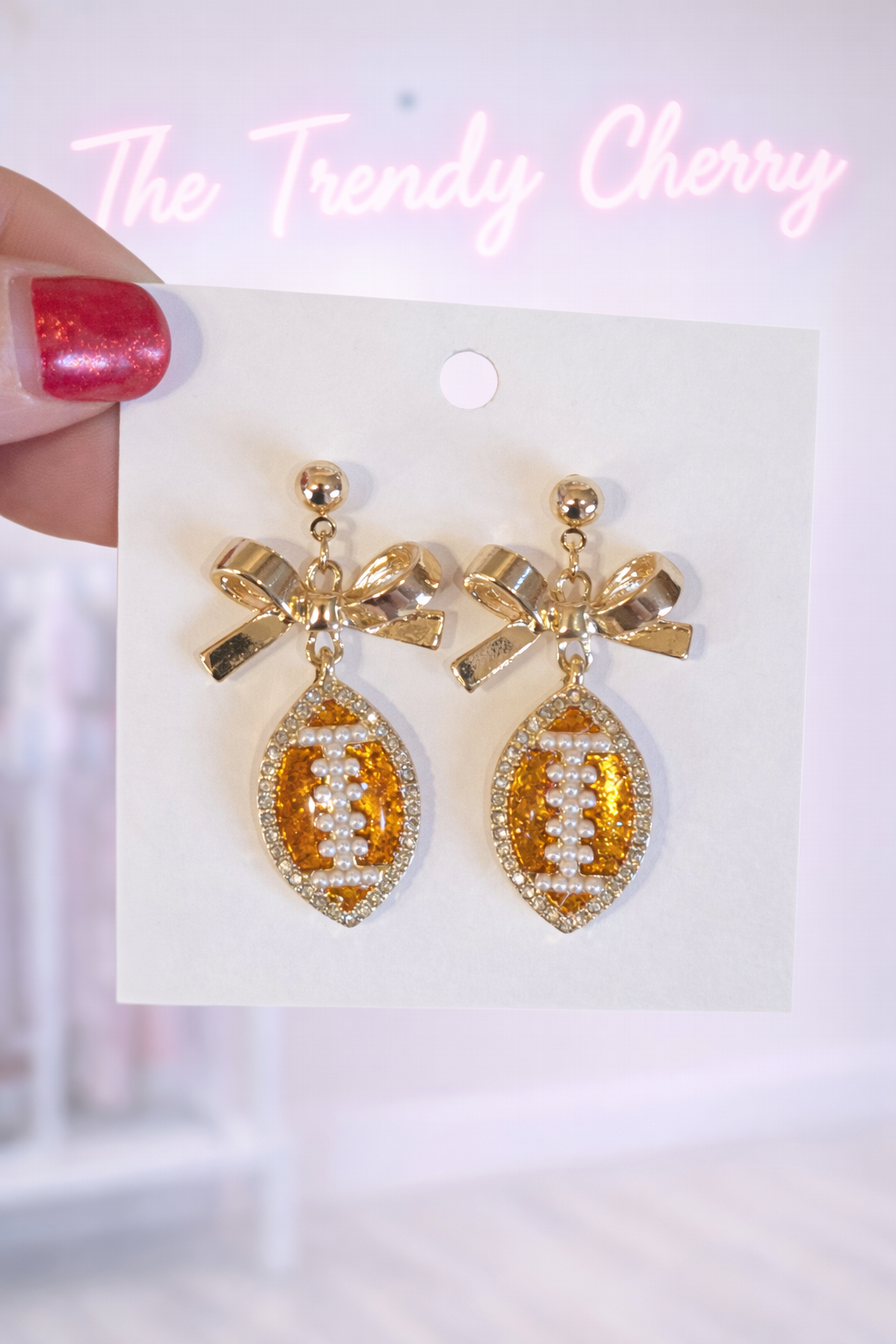 Classy football bow earrings