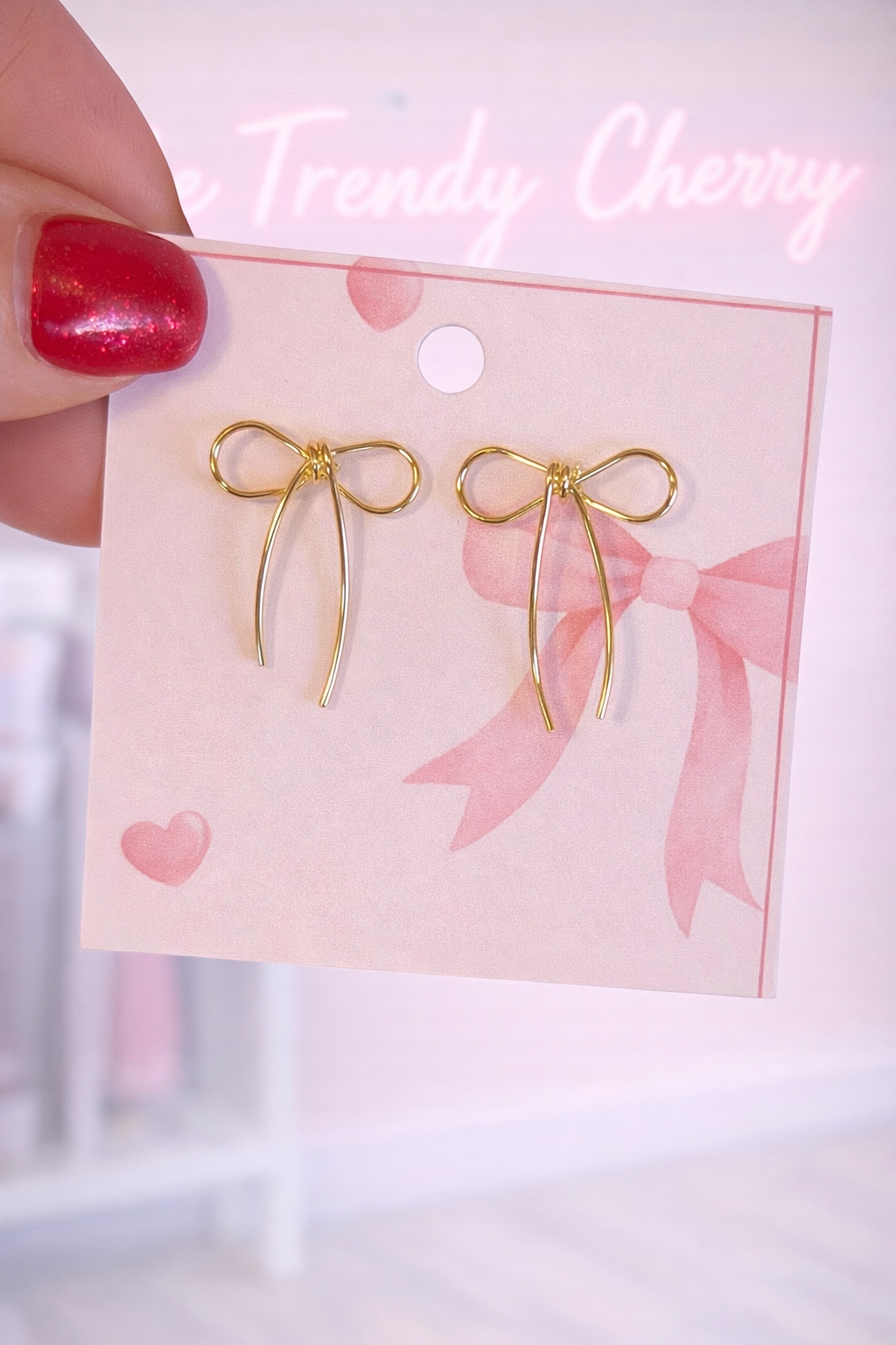Wow gold bow earrings