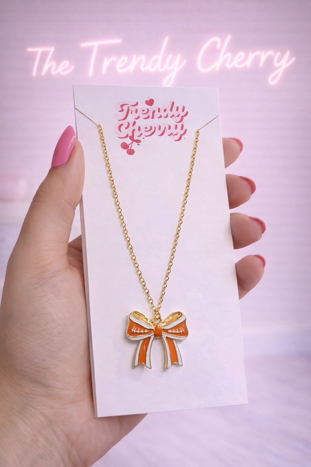 Orange bow necklace
