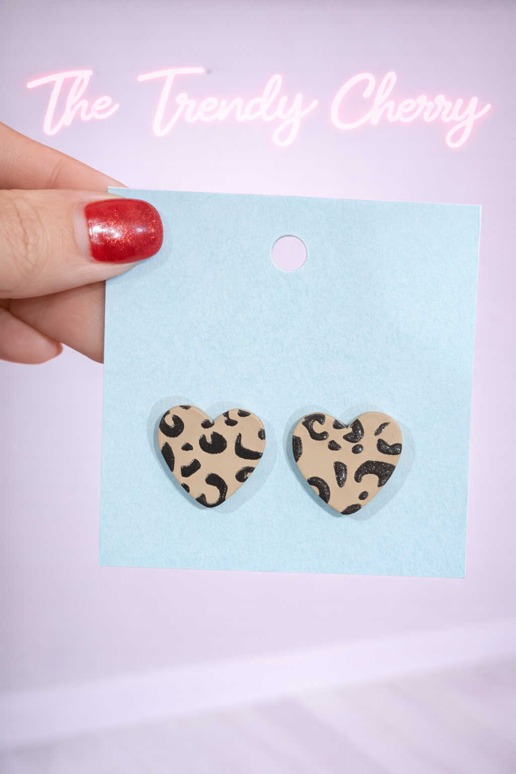 Gray and black leopard heart earrings