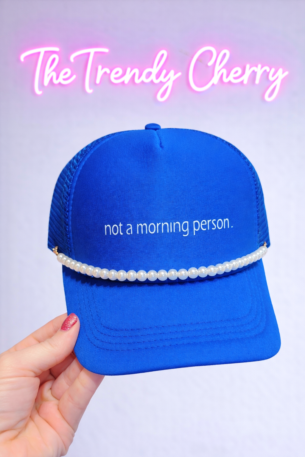 Not a morning person. Royal blue trucker hat with white pearl removable chain